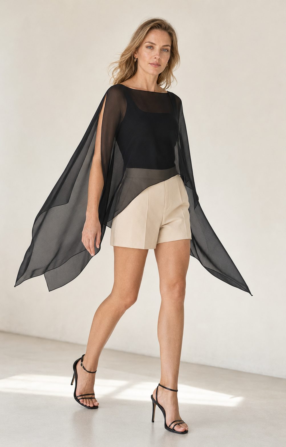 Aura cape poncho blouse in movement